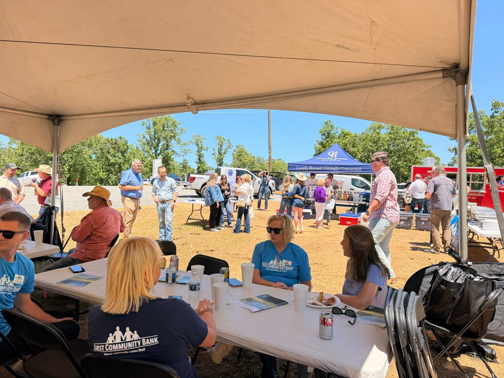 Grand opening crowd under the tent