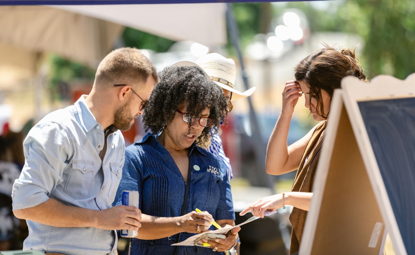 Lot signing at the grand opening event